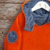 Kid's reversible hoody in orange/dark grey - close up