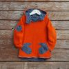 Kid's reversible hoody in orange/dark grey - fleece front