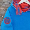 Kid's reversible hoody in turquoise/red - close up